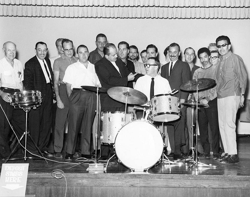 Joe Morello Drum Clinic at Professional Drum Shop in Hollywood – a young Tony Williams standing behind cymbal on right side of photo. Joe Morello Drum Clinic at Professional Drum Shop in Hollywood