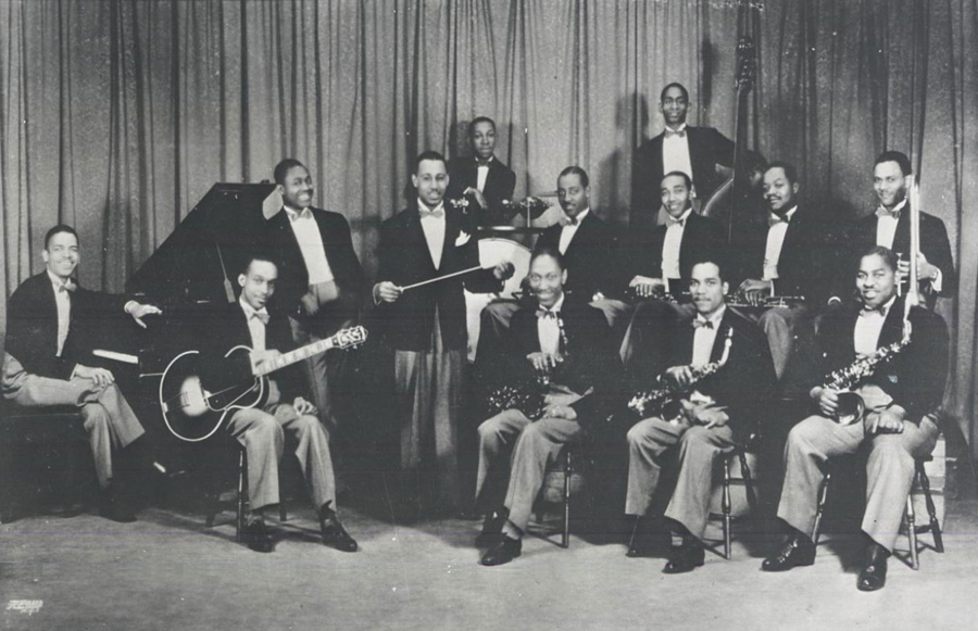 Teddy Hill Orchestra – Howard Swan Johnson (center, seated) Teddy Hill Orchestra - Howard Swan Johnson (center, seated)